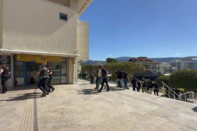 Marmaris'te optik mağazasına yönelik silahlı saldırıda 9 tutuklama